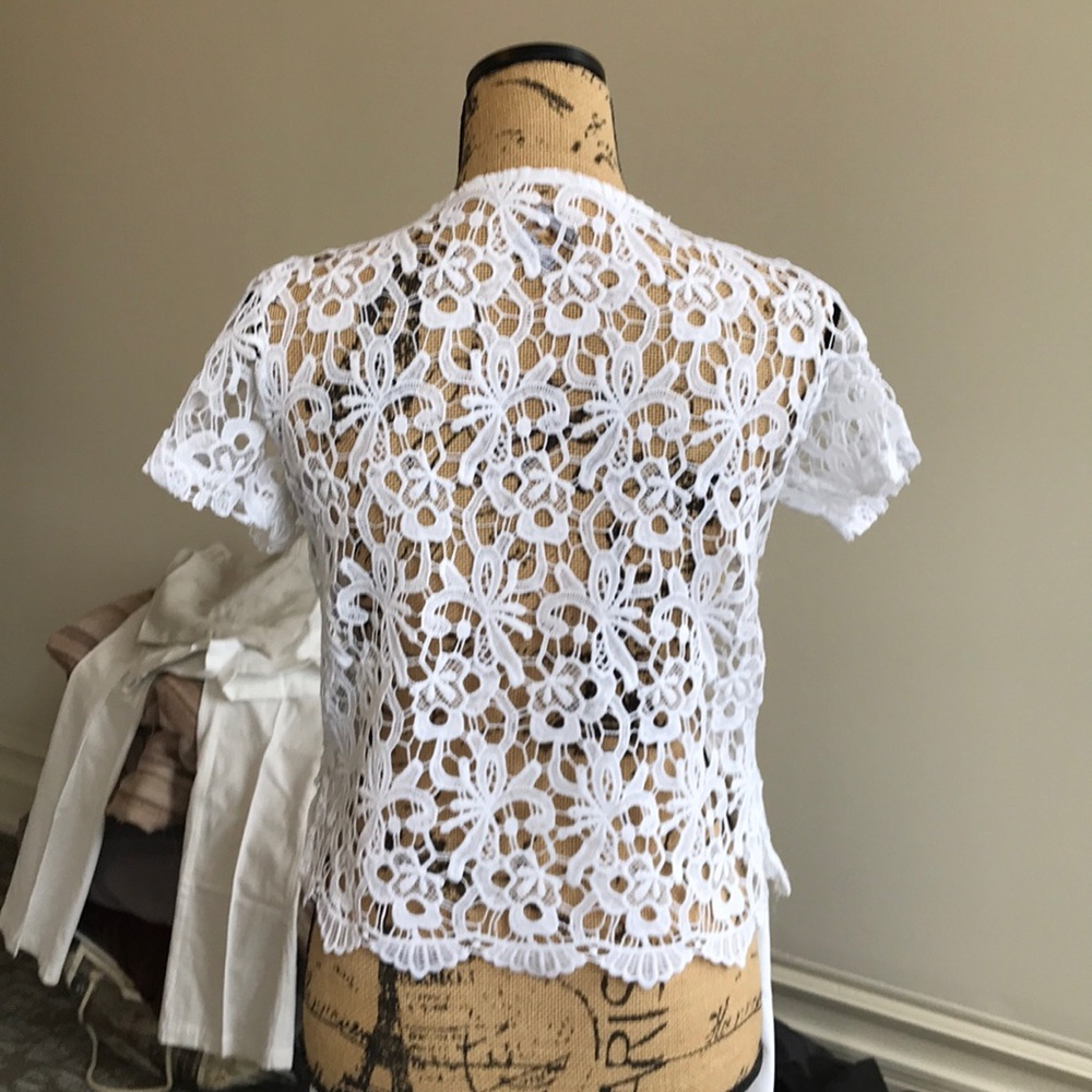 White overlay top. Cute and versatile!